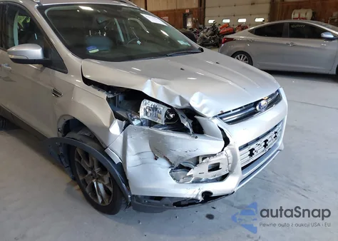 2014 Ford Escape Titanium z USA, uszkodzony, nr VIN 1FMCU9J95EUE19069